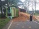 Dum Truck Muatan Tanah Terguling di Jalan Raya Cikupa