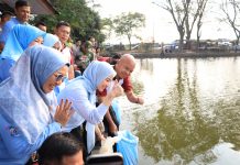 Polda Banten Gelar Gerakan Asri Polri dan Tebar 3.000 Bibit Ikan Nila di Danau Tasikardi
